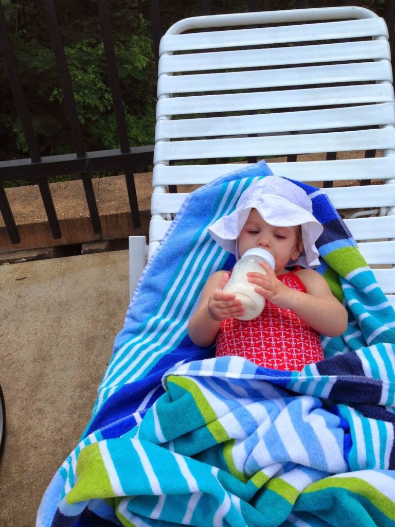 cute baby girl with bottle