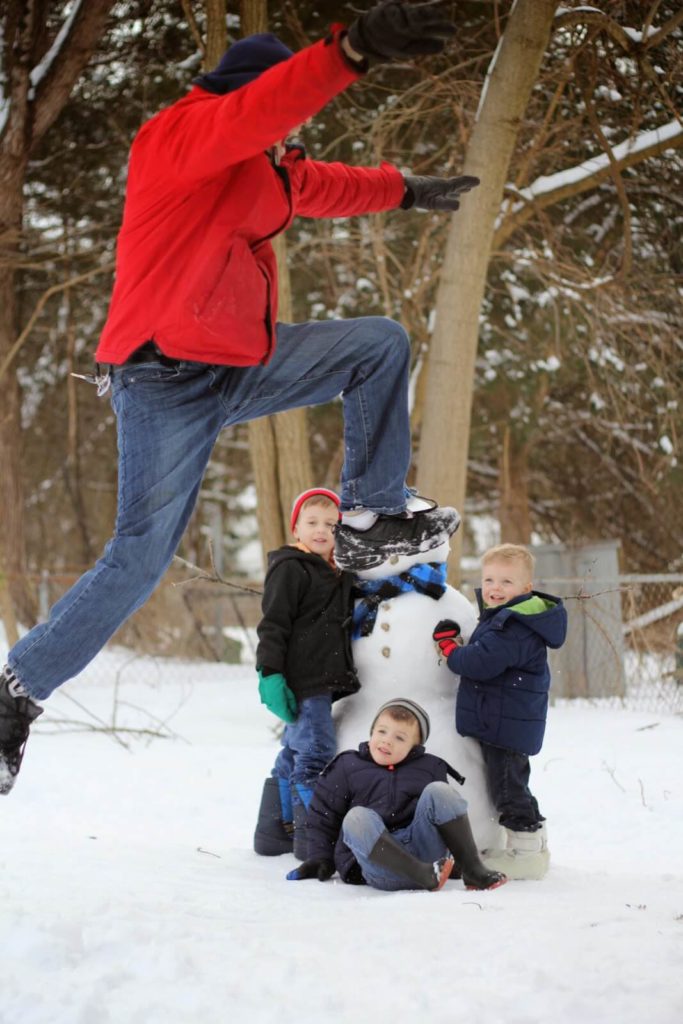 jumping over snowman