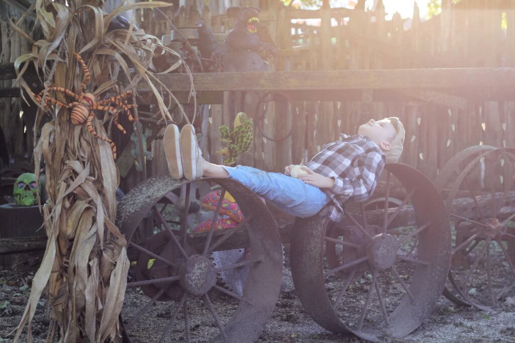 boy laying down on wheels