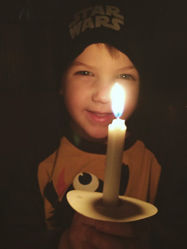little boy with candle