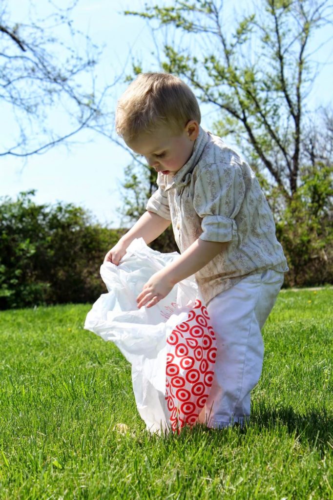 toddler searching for easter eggs