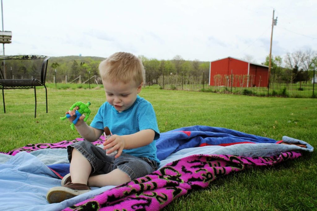 toddler boy playing with toys