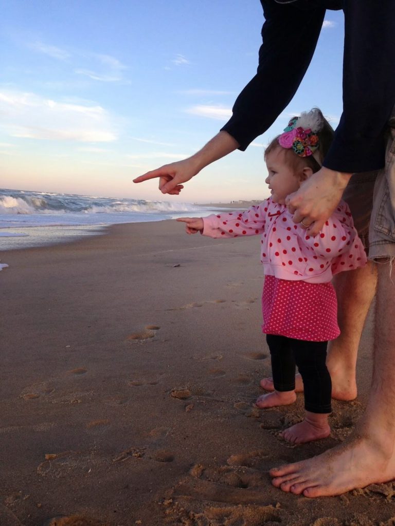 father daughter on beach