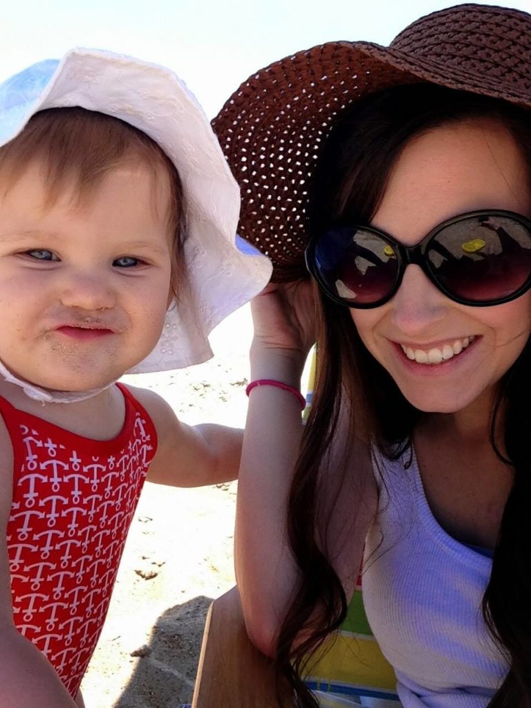 mom and baby on beach