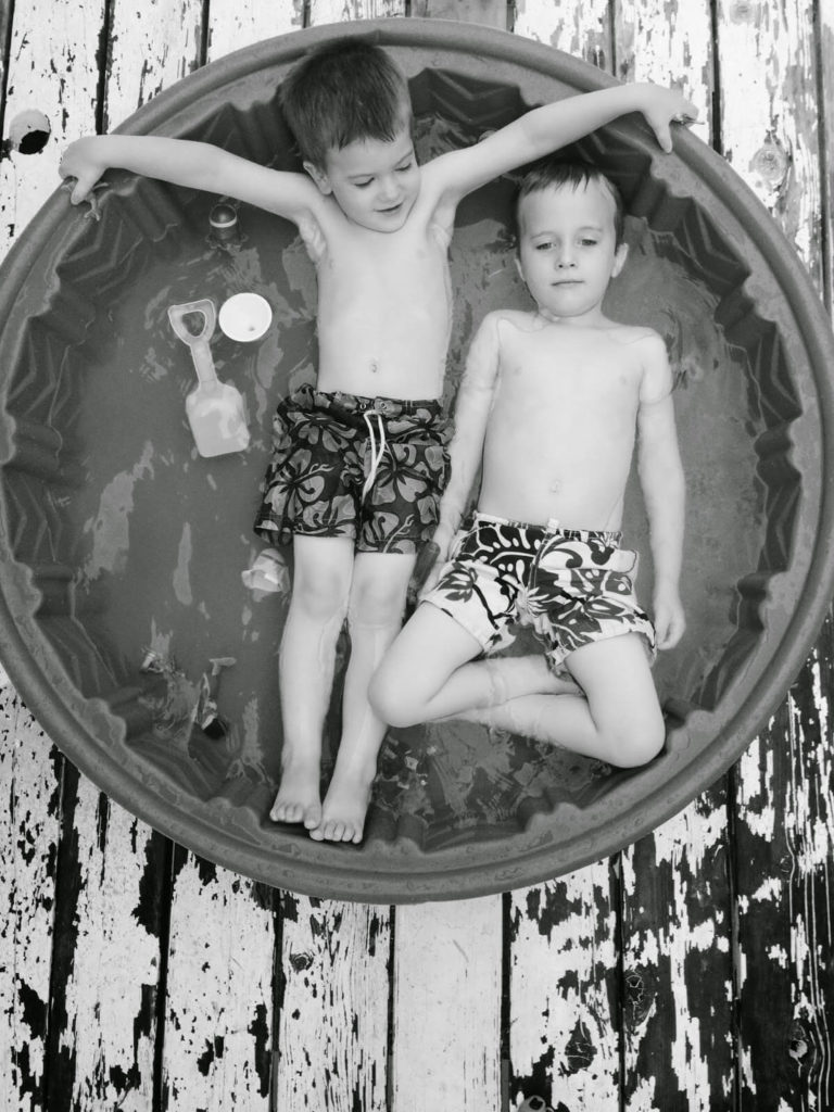 boys in the kiddie pool
