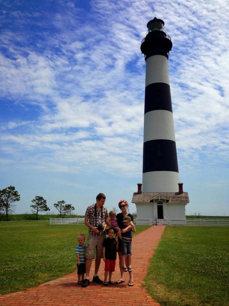 big family at lighthouse