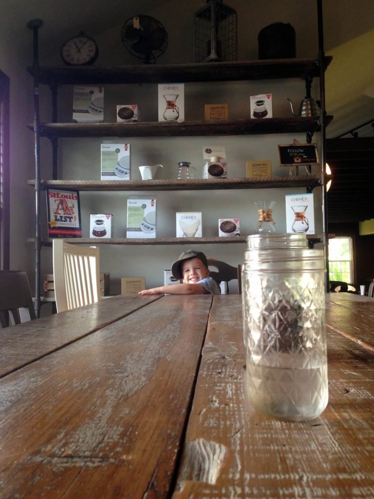 little boy at end of table