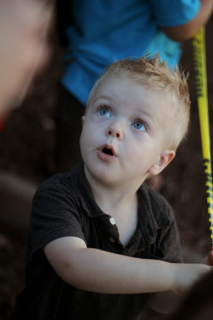 toddler boy looking amazed