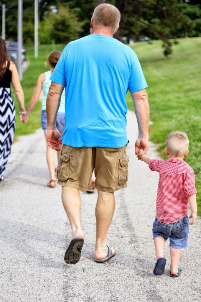 man and boy walking