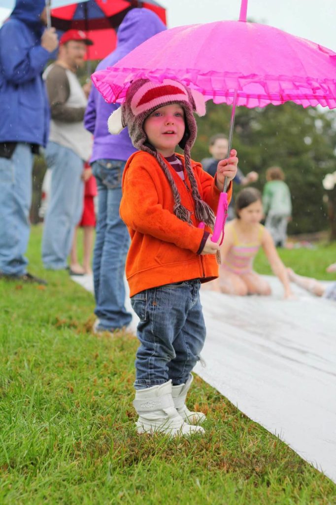 boy holding umbrella