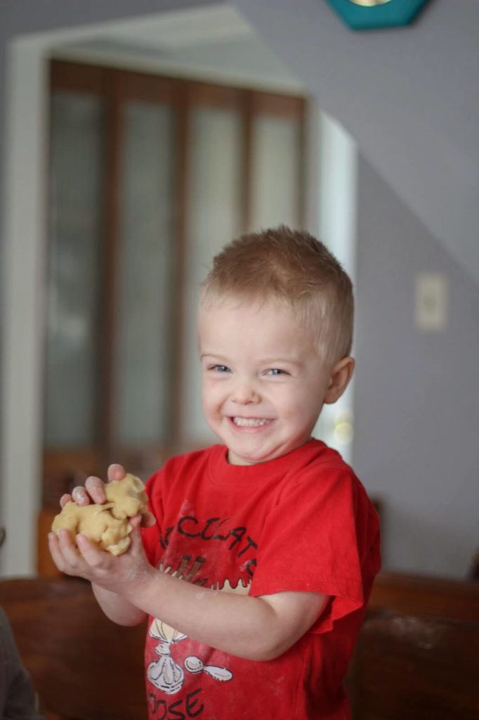 little boy making funny face