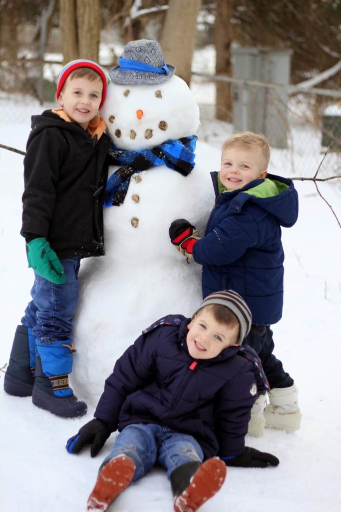 boys with snowman