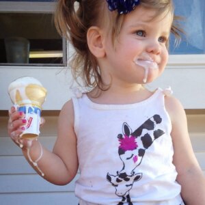 little girl with messy ice cream