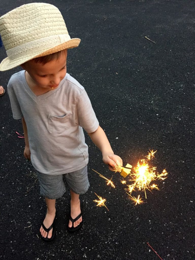 boy with sparklers