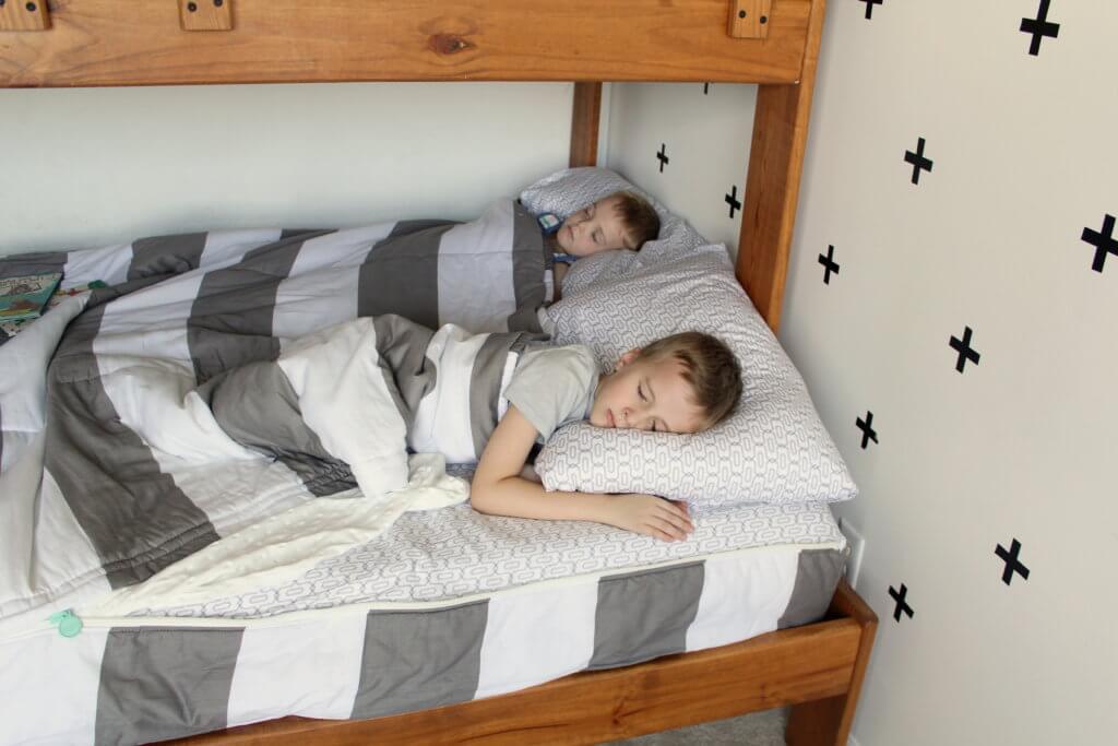 kids sleeping in bed